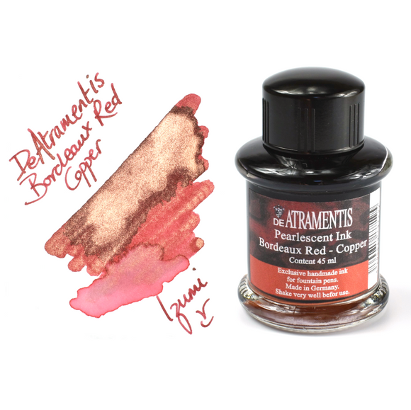 bottle and swatch of De Atramentis Pearlescent Bordeaux Red - Copper